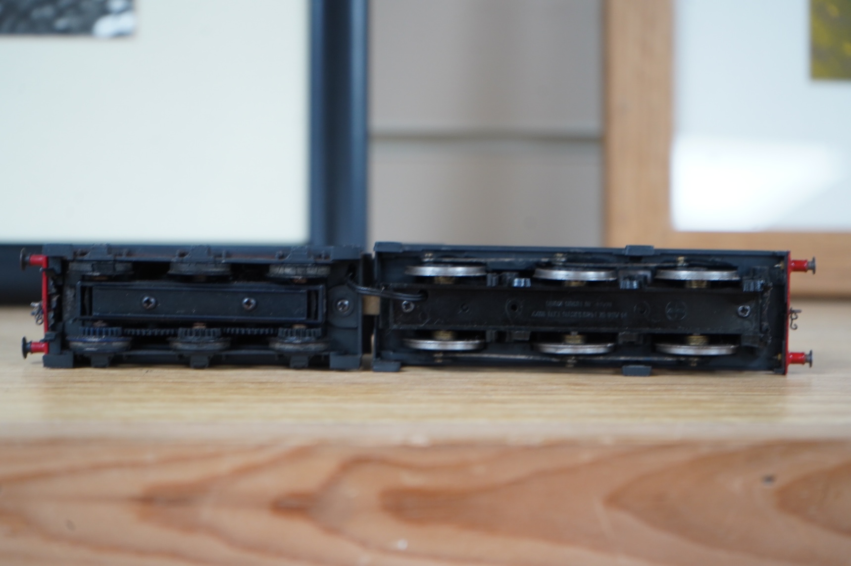 Two kit built and adapted EM gauge LMS railway locomotives; an 0-8-0, 9518, and an 0-6-0 class 4F based on an Airfix kit, together with the body only of an SR Schools Class